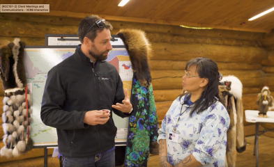 photo of two people talking